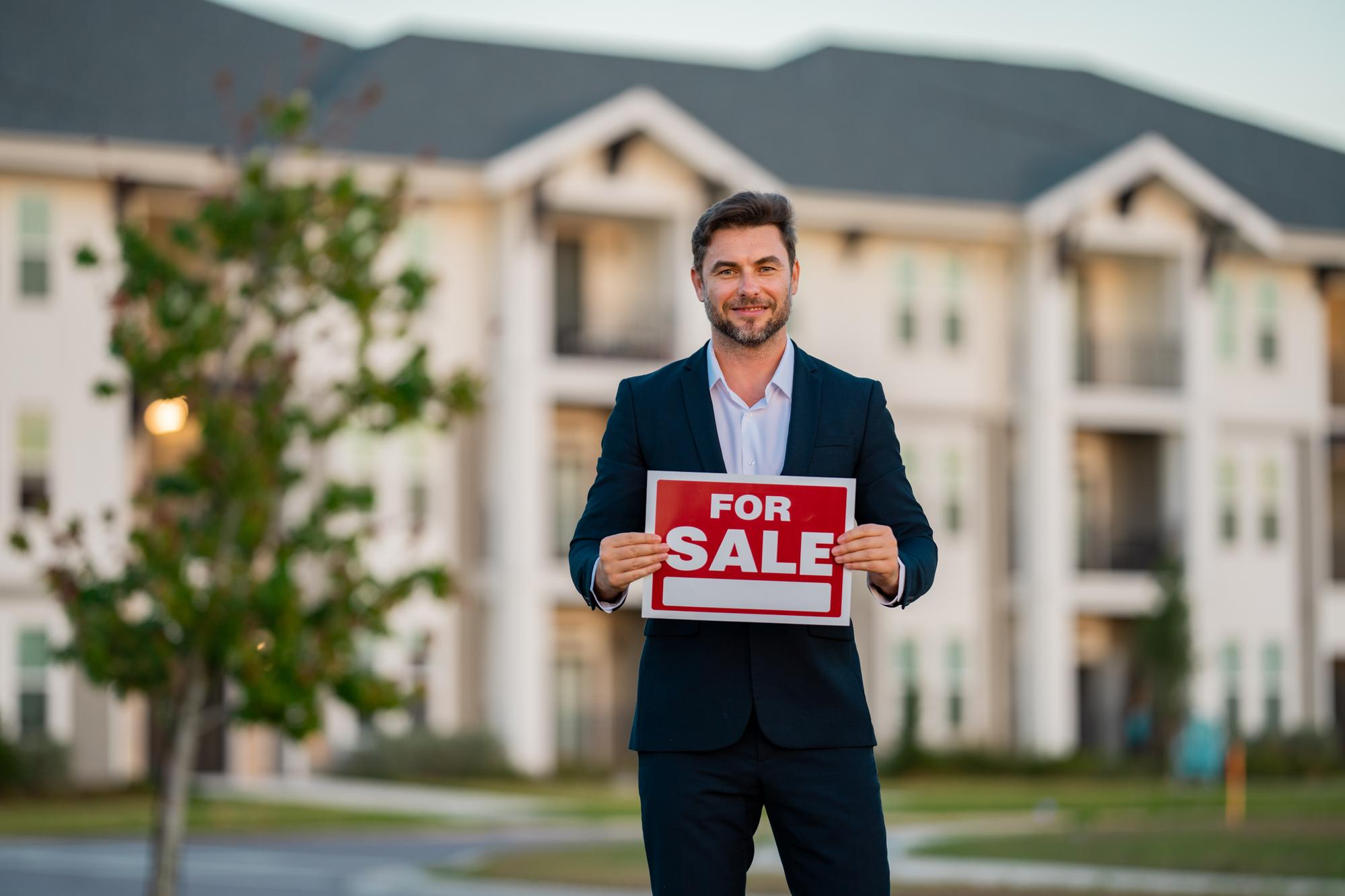 Real estate professional presenting a property for sale