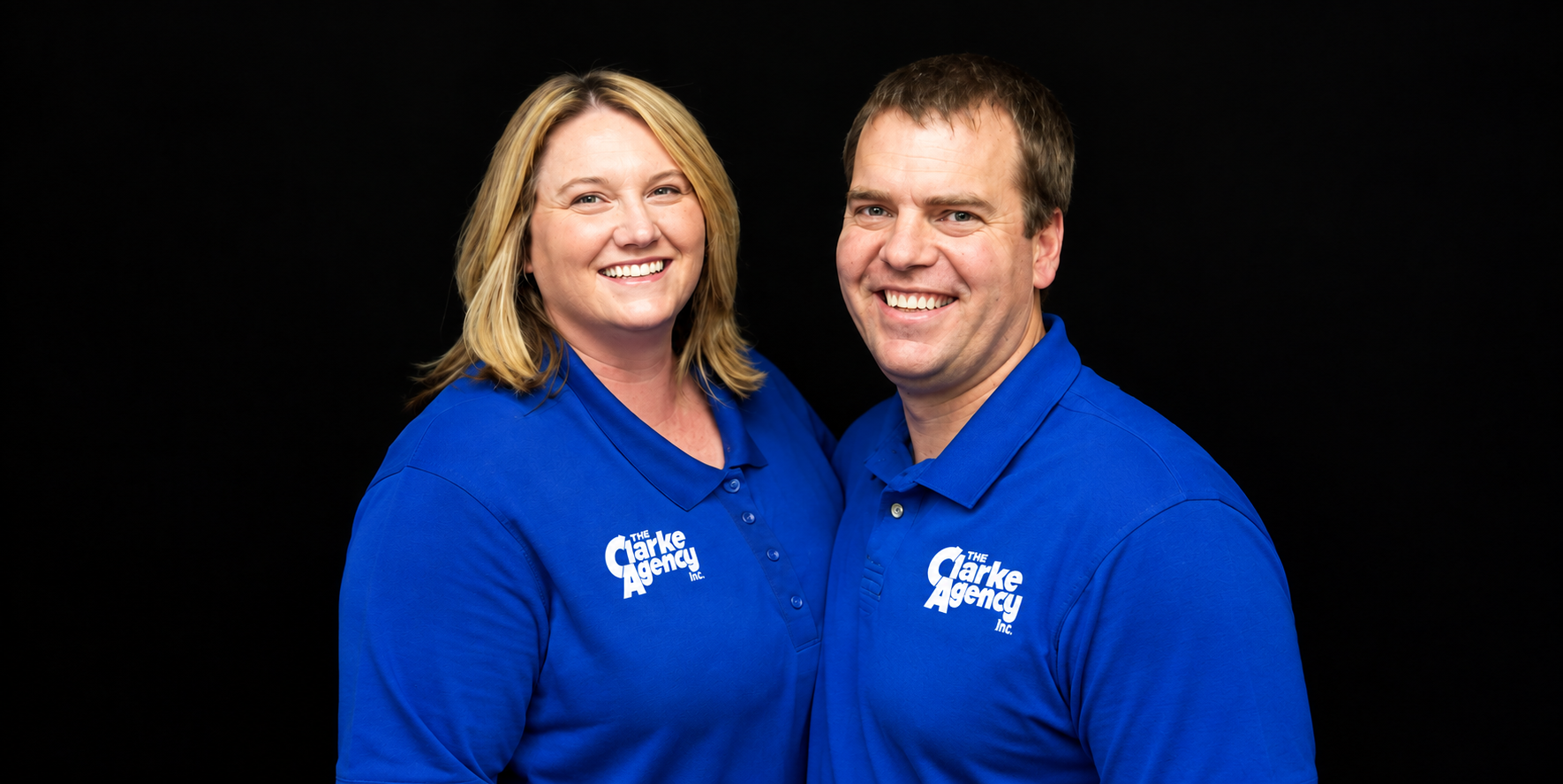 Audrie and Josh Townsend wearing Clarke Agency shirts